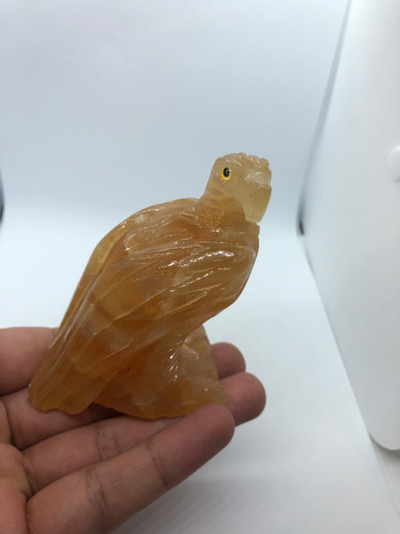 Orange calcite hand made eagle - RopesandRocks