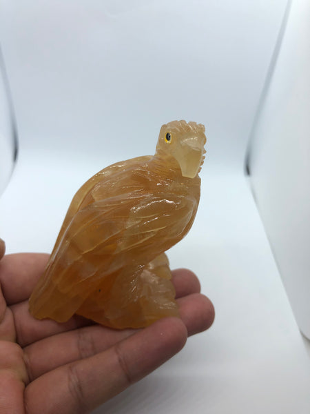 Orange calcite hand made eagle - RopesandRocks