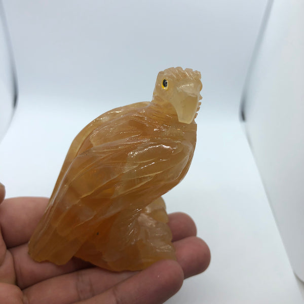 Orange calcite hand made eagle - RopesandRocks