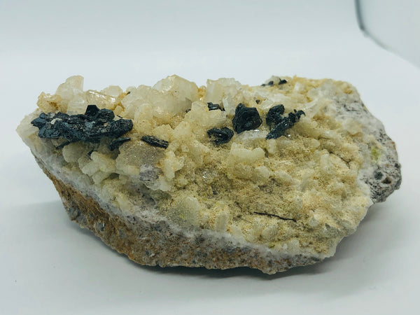 Hematite with albite - RopesandRocks