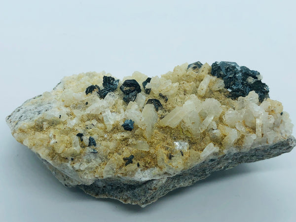 Hematite with albite - RopesandRocks