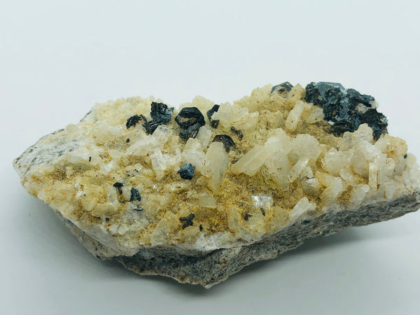 Hematite with albite - RopesandRocks