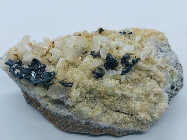 Hematite with albite - RopesandRocks