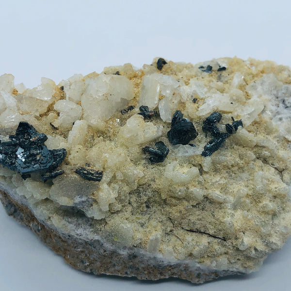 Hematite with albite - RopesandRocks