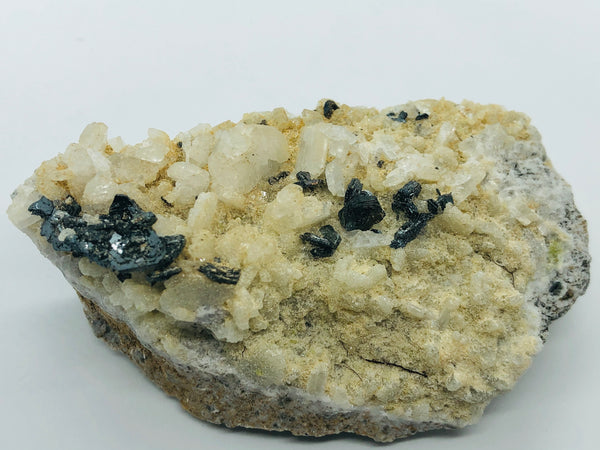 Hematite with albite - RopesandRocks