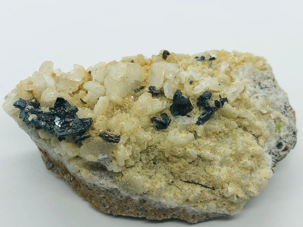 Hematite with albite - RopesandRocks