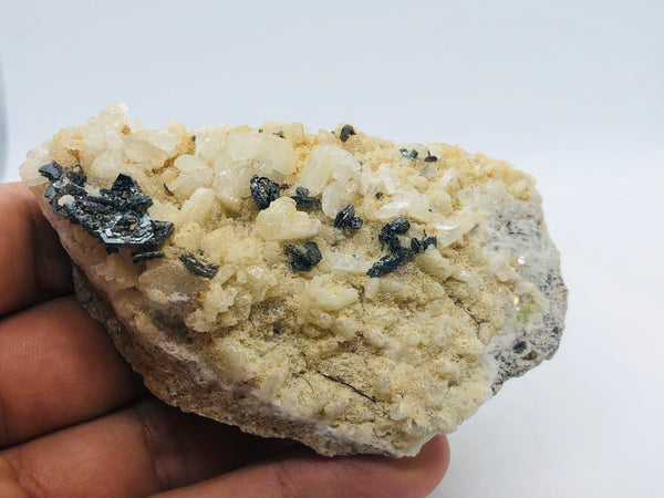 Hematite with albite - RopesandRocks